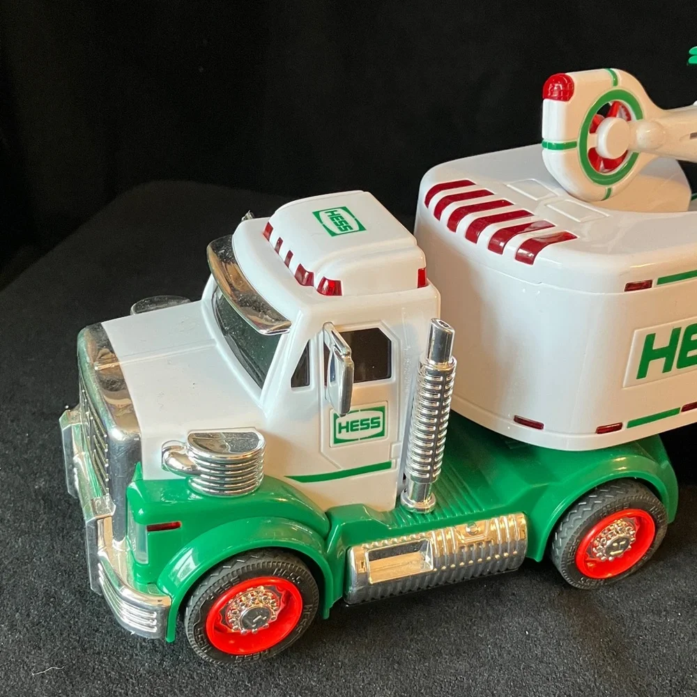 HESS Gasoline Semi Truck carrying helicopter Toy 2010 Toy plays sounds